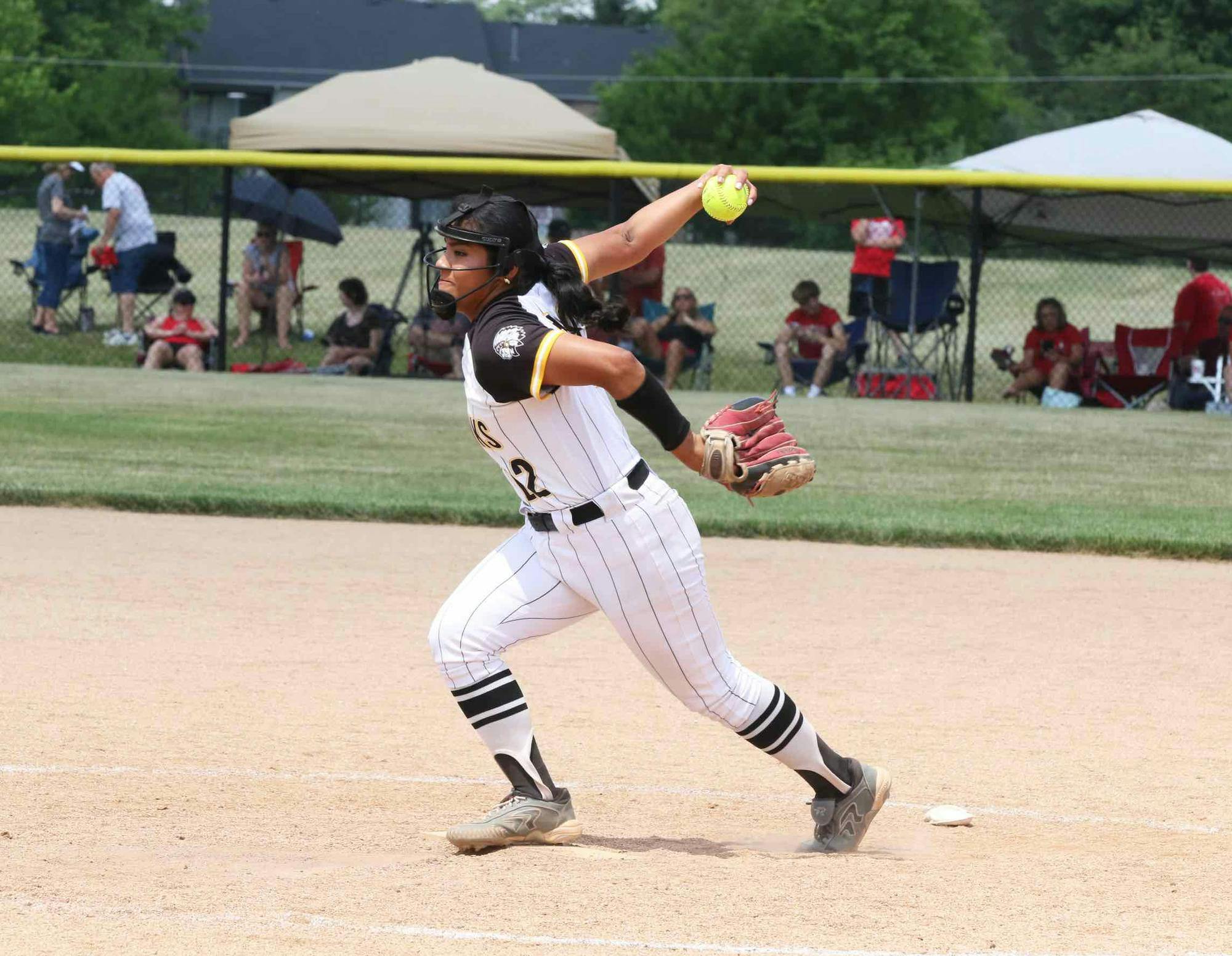 Cowan senior Tatum Rickert winds up June 3 during the first round of semi state at Logansport High School. Zach Carter, DN. 