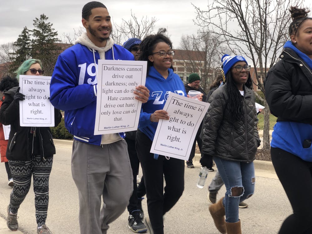 Walking down the streets of Ball State University's campus, several Ball State students recognize Martin Luther King Jr. Day by participating in a march in honor of King's legacy and racial equality Jan. 16. The "MLK March" was the second event of 2023's Unity Week. Zach Gonzalez, DN