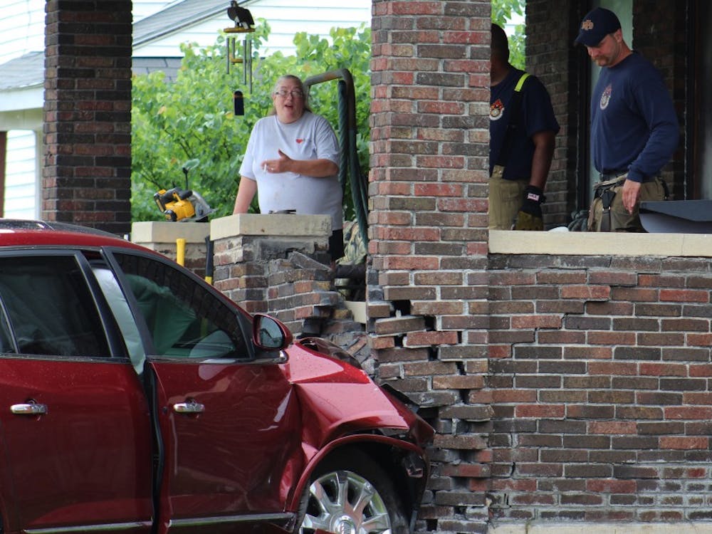 A multi-car collision in the area of North Cherry and West Main streets caused one car to collide with a home. The crash occurred after one car ran a stop sign. Only minor injuries were sustained. Brynn Mechem, DN