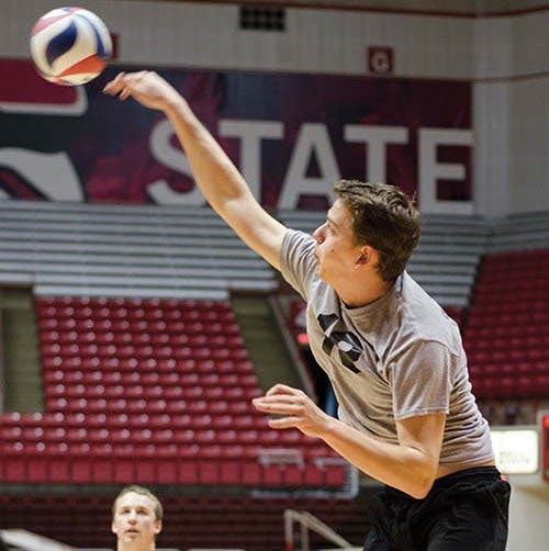 Sophomore Jon Clawson works on his hits during a morning practice on Friday. Clawson made his debut over the weekend against Barton College with a total of six kills. DN PHOTO COREY OHLENKAMP