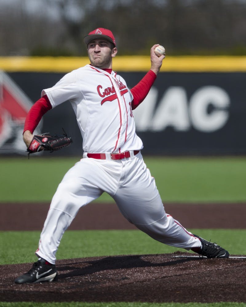 Senior pitcher Kevin Marnon pitches the ball during the game against Ohio University on April 2 at the First Merchants Ballpark Complex. Ball State lost 10-0, bringing the Cardinals losing streak to eight games in a row. Emma Rogers // DN