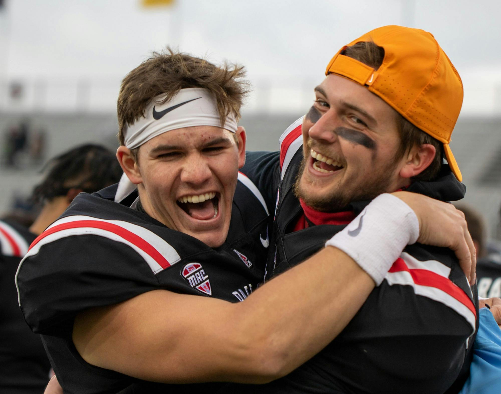Redshirt sophomore quarterback John Paddock and redshirt junior quarterback Elliot Charlebois celebrate Ball State&#x27;s win Dec. 12, 2020, at Scheumann Stadium. Ball State beat Western Michigan 30-27. Jaden Whiteman, DN