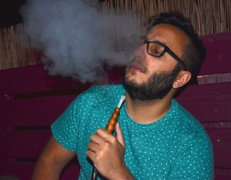 Saad AbuBakr, a senior computer science major who is from the Middle East, uses hookah as a way to socialize. Photo Provided