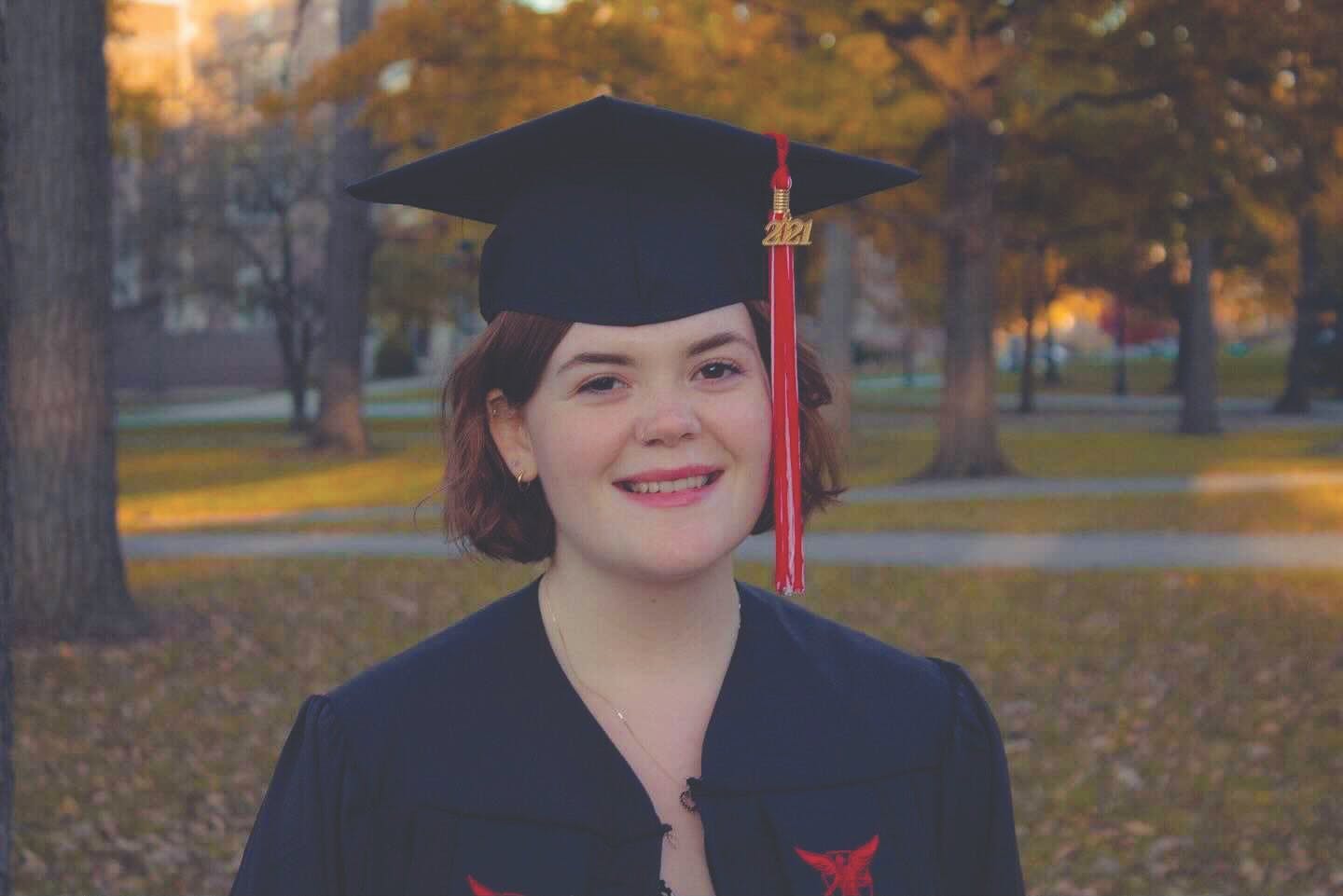 Lauren Kamykowski, senior political science and French double major, smiles for a graduation photo on Ball State&#x27;s campus. Kamykowski is a first-generation student who is graduating in three and a half years with two bachelor&#x27;s degrees. Lauren Kamykowski, Photo Provided