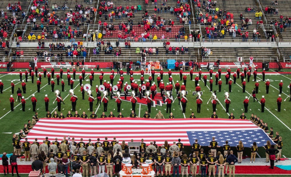 Members of Ball State's Army ROTC program present the flag on the field of Scheumann Stadium before the game against Northern Illinois on Oct. 1. Ball State lost 31-24. Grace Ramey // DN