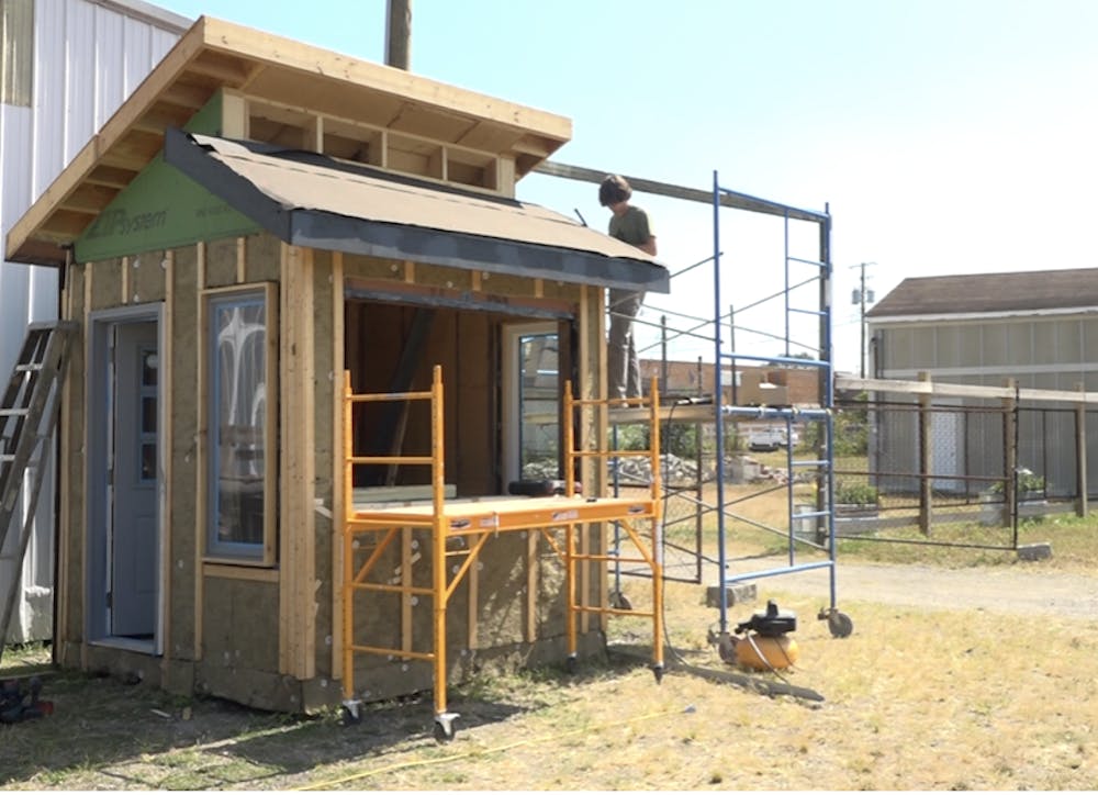 <p>Architecture Student, Logan Heller, works on a sustainable home. Stella Davis, NewsLink Indiana</p>