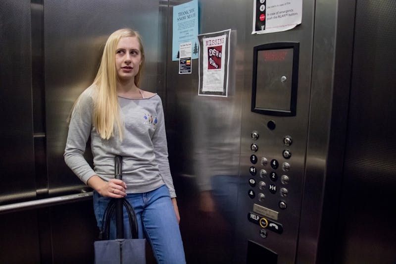 Chloe Fellwock takes a vacuum up to her dorm Nov. 25, 2019, in DeHorty Complex. Fellwock does not enjoy filler talk like the question "what are you going to do with the vacuum?" when a vacuum has one primary purpose. Eric Pritchett, DN