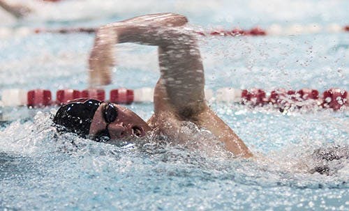 Cam Watters competes against Evansville in the freestyle on Jan. 25 at the Lewellen Aquatic Center. The team competed in the Butler invitation on Jan. 27. DN PHOTO JONATHAN MIKSANEK