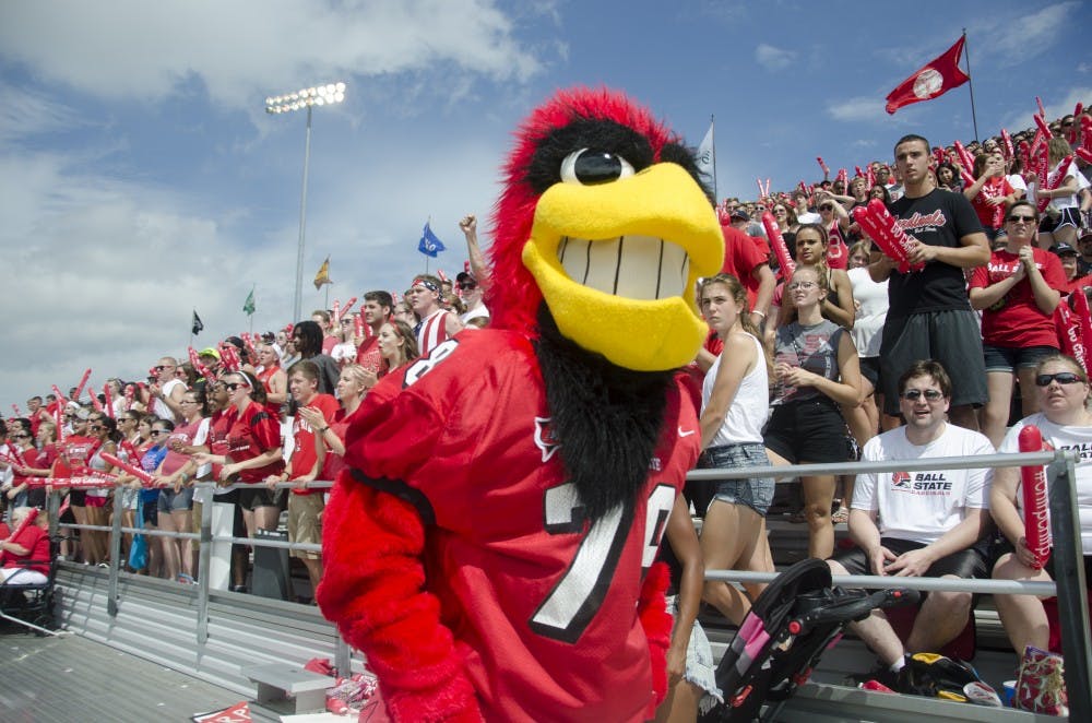 Charlie Cardinal cheers on the Ball State football along with fans in The Nest during the game against Colgate on Aug. 30 at Scheumann Stadium. DN PHOTO BREANNA DAUGHERTY 