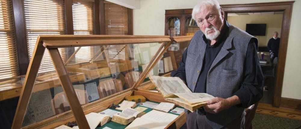 Brian Bex reads through one of the rare books in the collection he started in 1997. Currently, he has collected more than 1,300 books that students and professors at different universities can browse and use for information. E. B. and Bertha C. Ball Center, photo courtesy. 