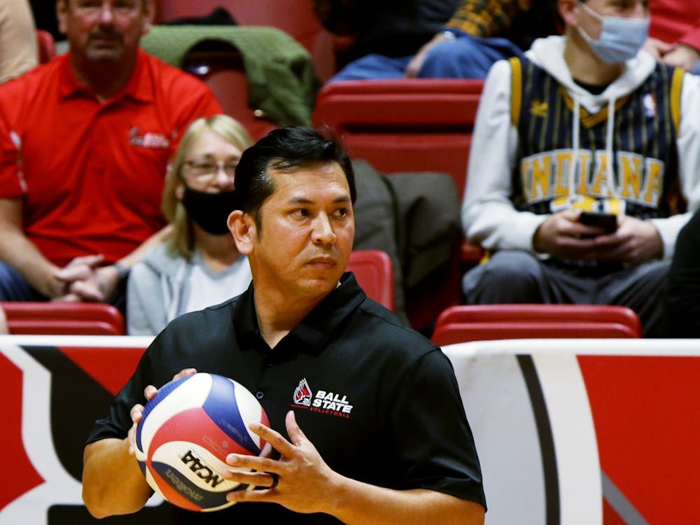 Ball State men's volleyball head coach Donan Cruz hold a volleyball during the game against George Mason University on Jan. 21, 2022, at Worthen Arena in Muncie, IN. Amber Pietz, DN