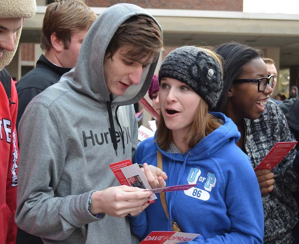 Trevor Eadler, a sophomore computer science major, Jessica Lloyd, a freshman special education major gather with their friends as they discuss “A Conversation with David Letterman and Oprah Winfrey.” The event will take place at 4 p.m. Nov. 26 in John R. Emens Auditorium. DN PHOTO SHAE GIST