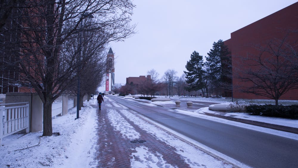 A student walks to class Jan 29. Ball State will be closed Wednesday and Thursday morning. Scott Fleener, DN