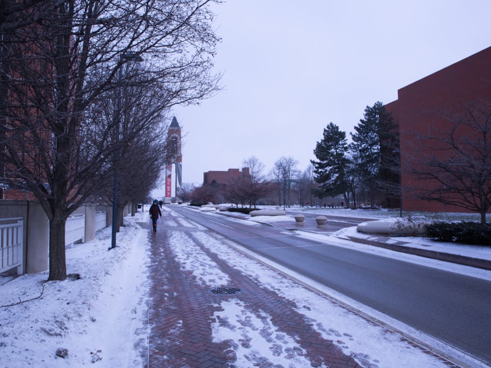 A student walks to class Jan 29. Ball State will be closed Wednesday and Thursday morning. Scott Fleener, DN
