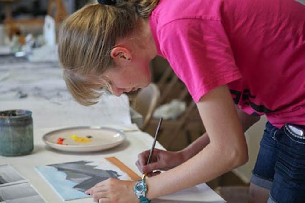 A student at Cornerstone Center for the Arts paints during one of the 2012 classes. Cornerstone offers classes in a variety of arts including dance, theatre and painting. PHOTO COURTESY OF CORNERSTONE CENTER FOR THE ARTS