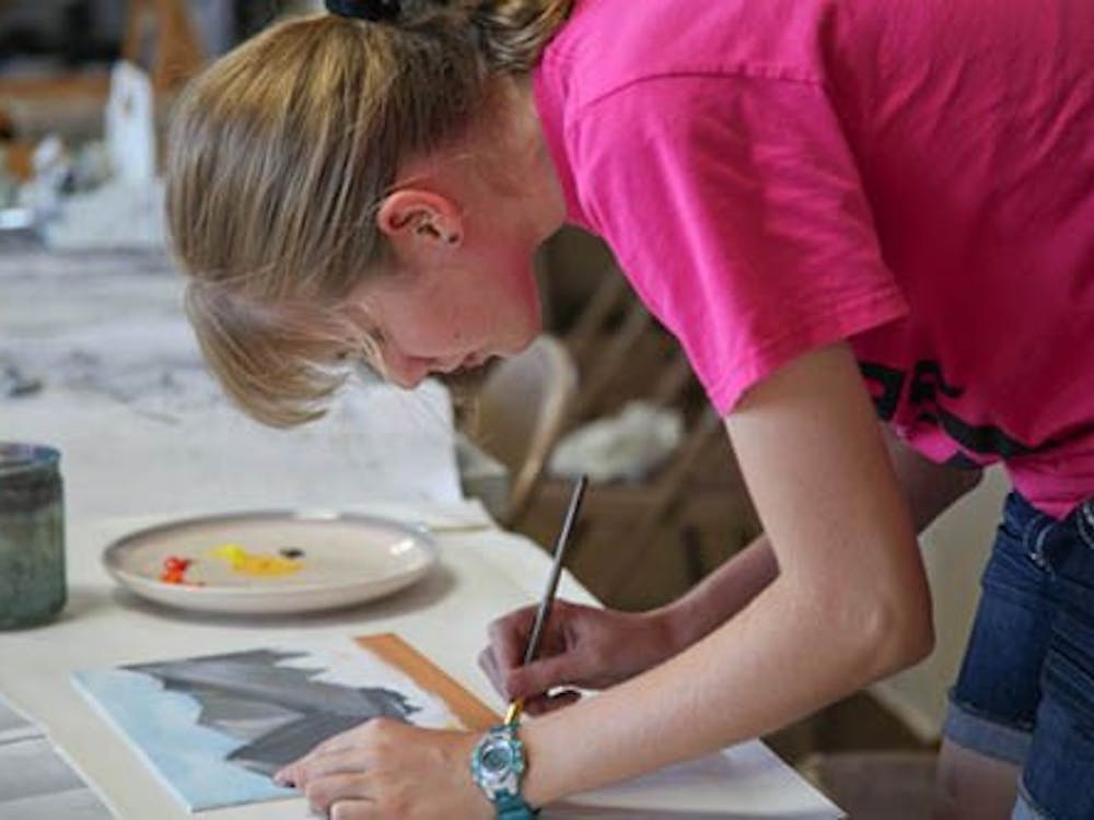 A student at Cornerstone Center for the Arts paints during one of the 2012 classes. Cornerstone offers classes in a variety of arts including dance, theatre and painting. PHOTO COURTESY OF CORNERSTONE CENTER FOR THE ARTS