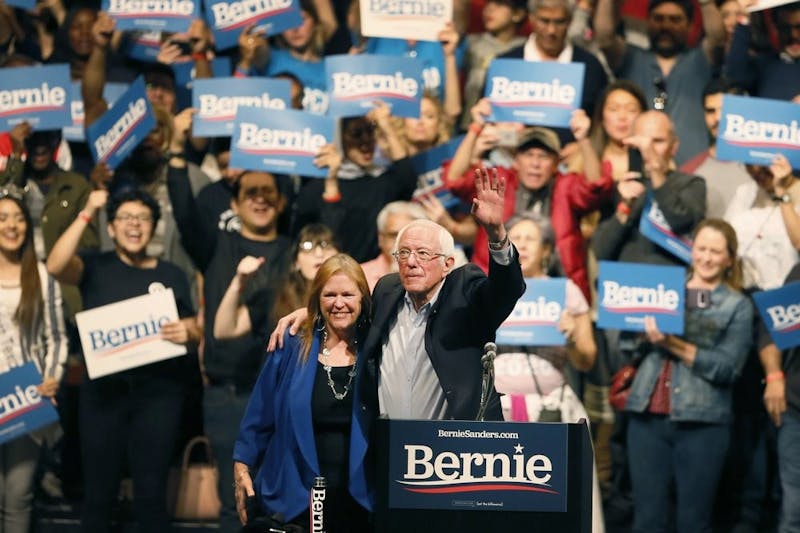 Democratic presidential candidate Sen. Bernie Sanders, I-Vt., with his wife Jane O'Meara Sanders, waves his hand during a rally in El Paso, Texas, Saturday, Feb. 22, 2020. (Briana Sanchez/The El Paso Times via AP)