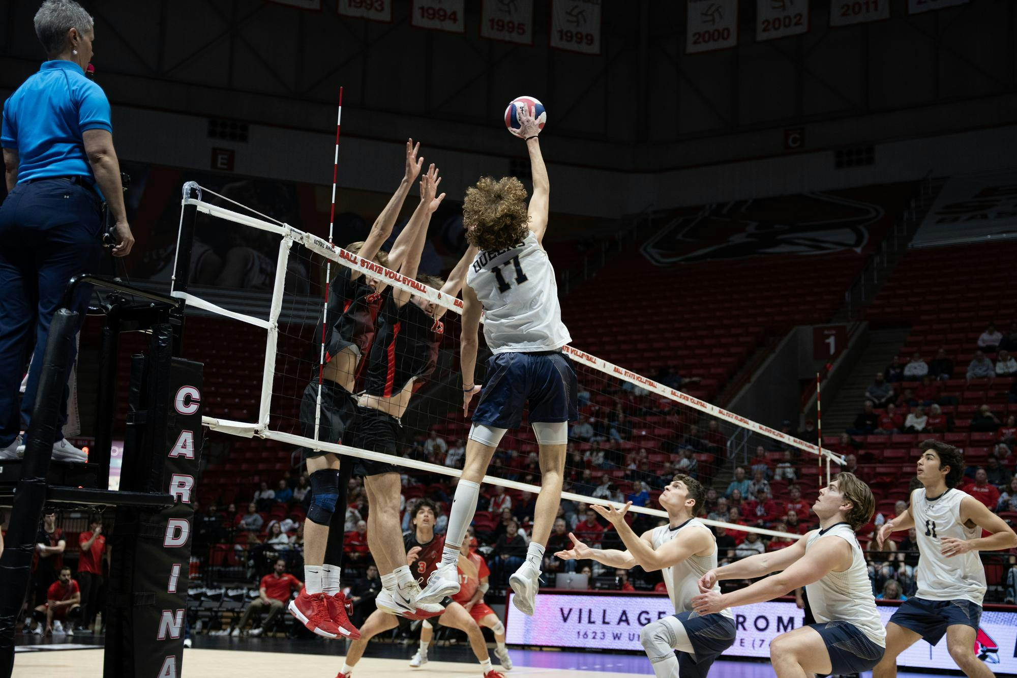 Junior opposite side Connor Dell spikes the ball at Ball State’s defense Feb. 6 At worthen Arena. Kyle Ingermann, DN