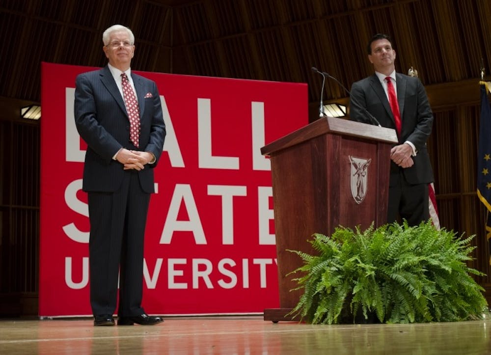 <p><strong>Paul Ferguson</strong>, left, stands after being announced as Ball State's new president. Ferguson's five-year contract with the university starts Aug. 1, his first day in office. <strong>DN FILE PHOTO BREANNA DAUGHERTY</strong></p>