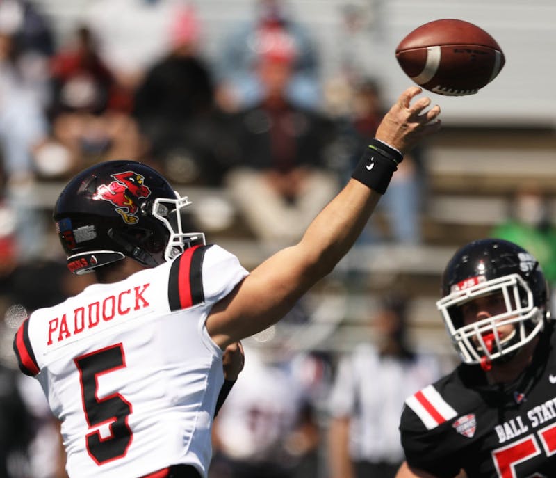 Redshirt junior quarterback John Paddock passes the ball May 1, 2021, at Scheumann Stadium. The Cardinals practiced and took part in a game of offensive against defense for the first Spring Homecoming in Ball State history. Jaden Whiteman, DN