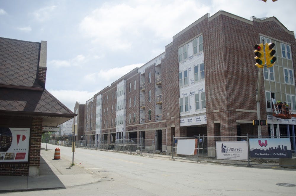 The Village Promenade, which sits in the village, started construction in October of 2013, and held 266 apartment units and 22,000 square feet of retail space.  DN FILE PHOTO BREANNA DAUGHERTY