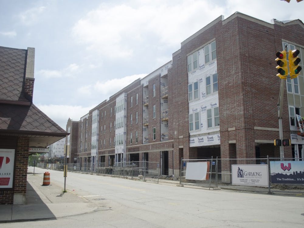 The Village Promenade, which sits in the village, started construction in October of 2013, and held 266 apartment units and 22,000 square feet of retail space.  DN FILE PHOTO BREANNA DAUGHERTY