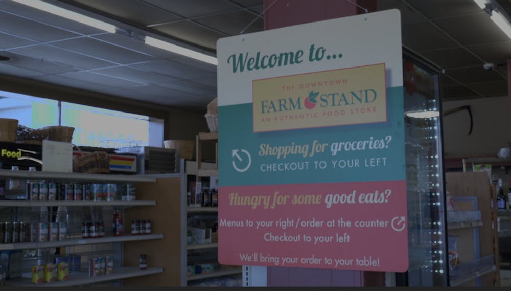 The entry sign describing the Downtown Farmstand’s amenities. 