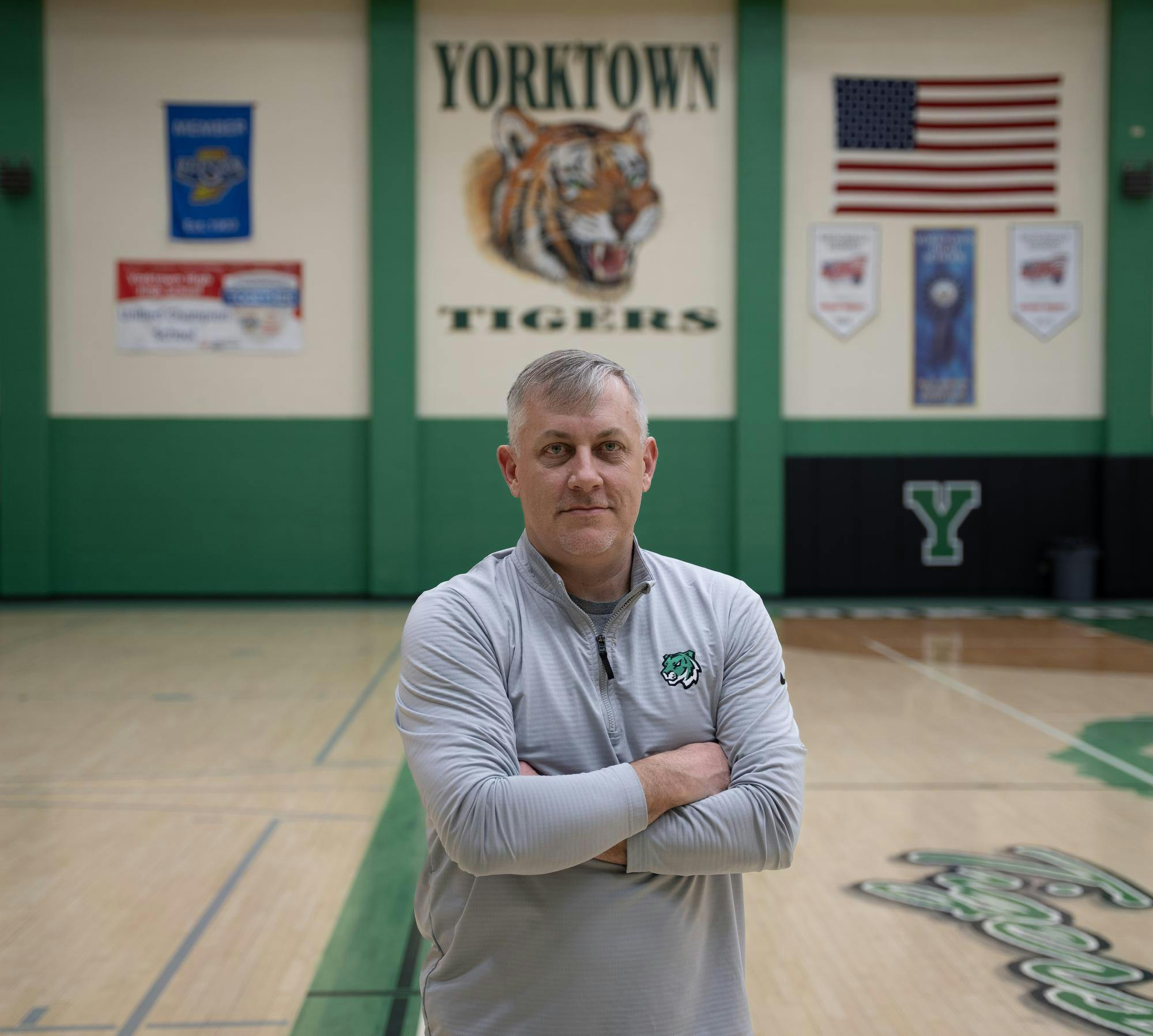 New Yorktown High School Head Basketball Coach Justin Ullom poses for photo March 31 at Yorktown High school. Kyle Ingermann=, DN
