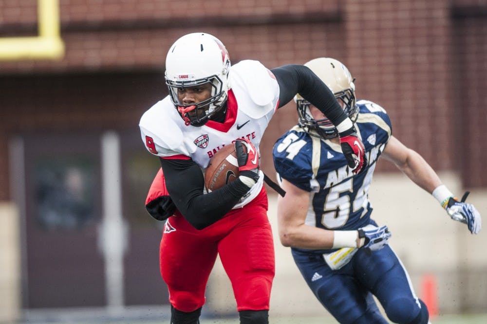 Sophomore wide receiver Jordan Williams makes a push down field against the University of Akron on Oct. 26 at InCision Stadium. Williams had the top receiving yards against Akron with 124. DN PHOTO JONATHAN MIKSANEK