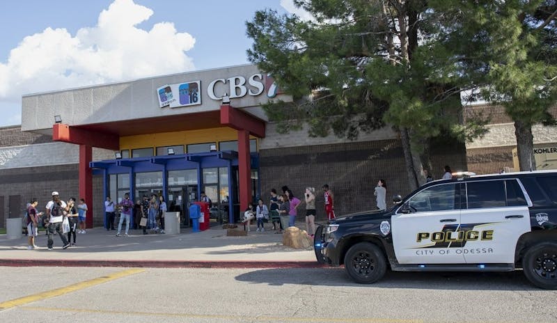 Odessa police officers park their vehicle outside Music City Mall in Odessa, Texas, Saturday, Aug. 31, 2019, as they investigate areas following a deadly shooting in the area of Odessa and Midland. Several people were dead after a gunman who hijacked a postal service vehicle in West Texas shot more than 20 people, authorities said Saturday. The gunman was killed and a few law enforcement officers were among the injured. (Jacy Lewis/Reporter-Telegram via AP)