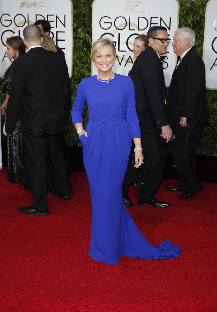 Amy Poehler arrives at the 72nd Annual Golden Globe Awards show at the Beverly Hilton Hotel in Beverly Hills, Calif., on Sunday, Jan. 11, 2015. (Jay L. Clendenin/Los Angeles Times/TNS)
