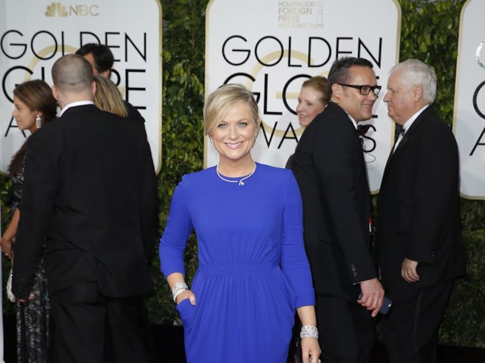 Amy Poehler arrives at the 72nd Annual Golden Globe Awards show at the Beverly Hilton Hotel in Beverly Hills, Calif., on Sunday, Jan. 11, 2015. (Jay L. Clendenin/Los Angeles Times/TNS)
