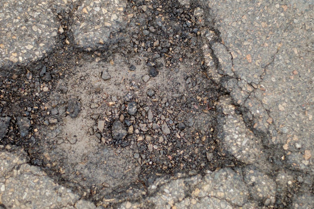Twitter account helps drivers report Muncie potholes 