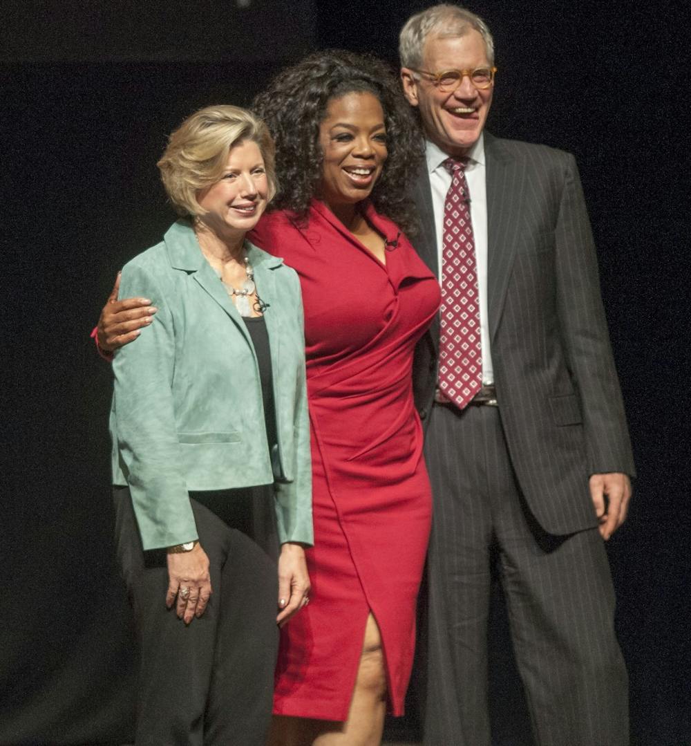 Ball State President Jo Ann Gora poses with Oprah Winfrey and David Letterman for "Dave + Oprah" at John R. Emen's Auditorium on Nov. 26. Gora announced in an email she will retire in June, 2014. DN FILE PHOTO BOBBY ELLIS