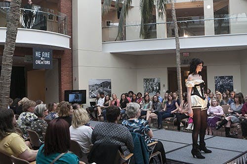 A model stands before the Crowd, modeling a piece by Krista Altland, at the We are the Creators fashion show on Sunday evening.  DN PHOTO JORDAN HUFFER