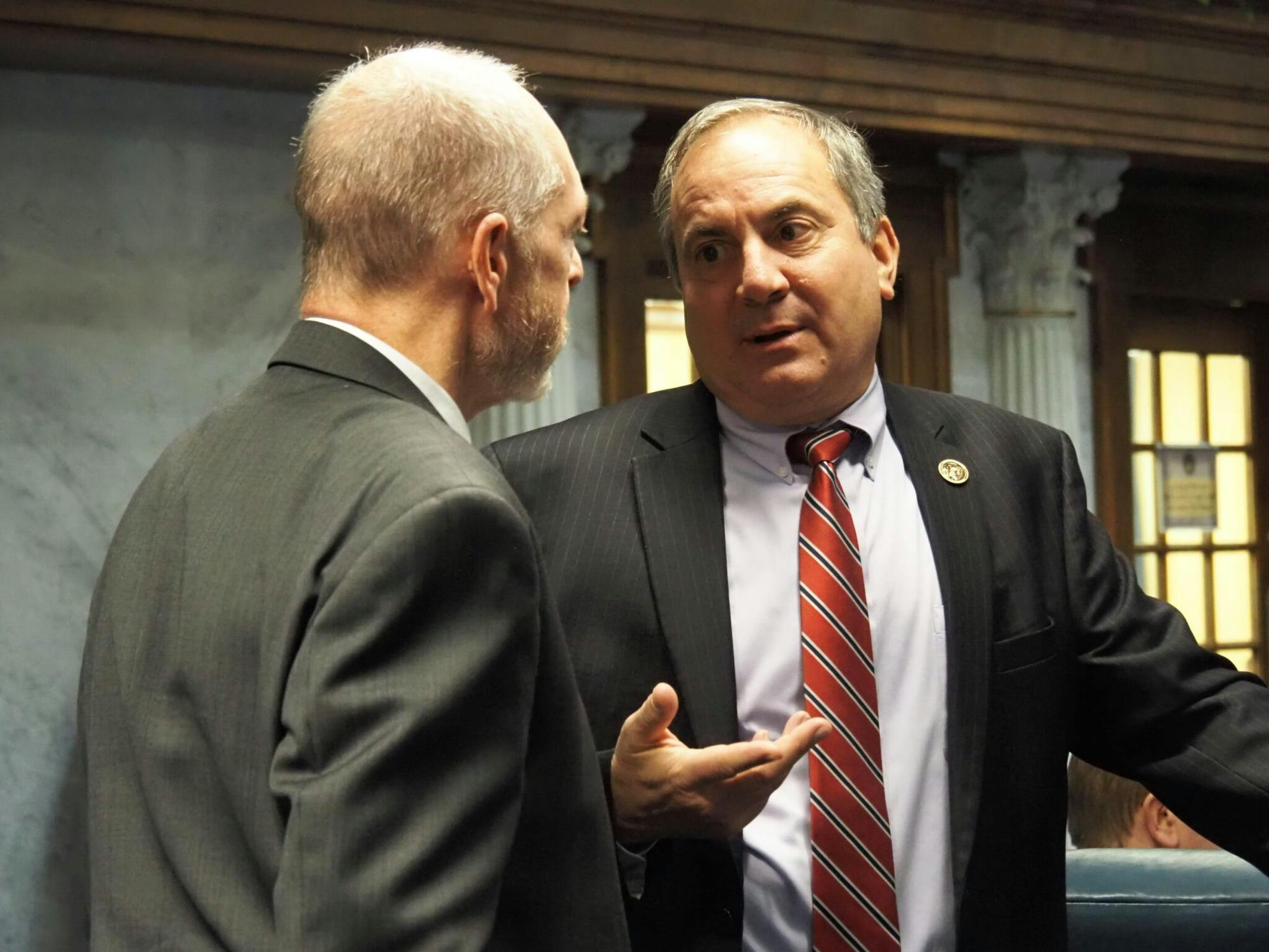 Sen. Mike Bohacek, right, talks to Sen Greg Walker, R-Columbus, on the Senate floor on Jan. 23, 2025. Provided: Whitney Downard/Indiana Capital Chronicle