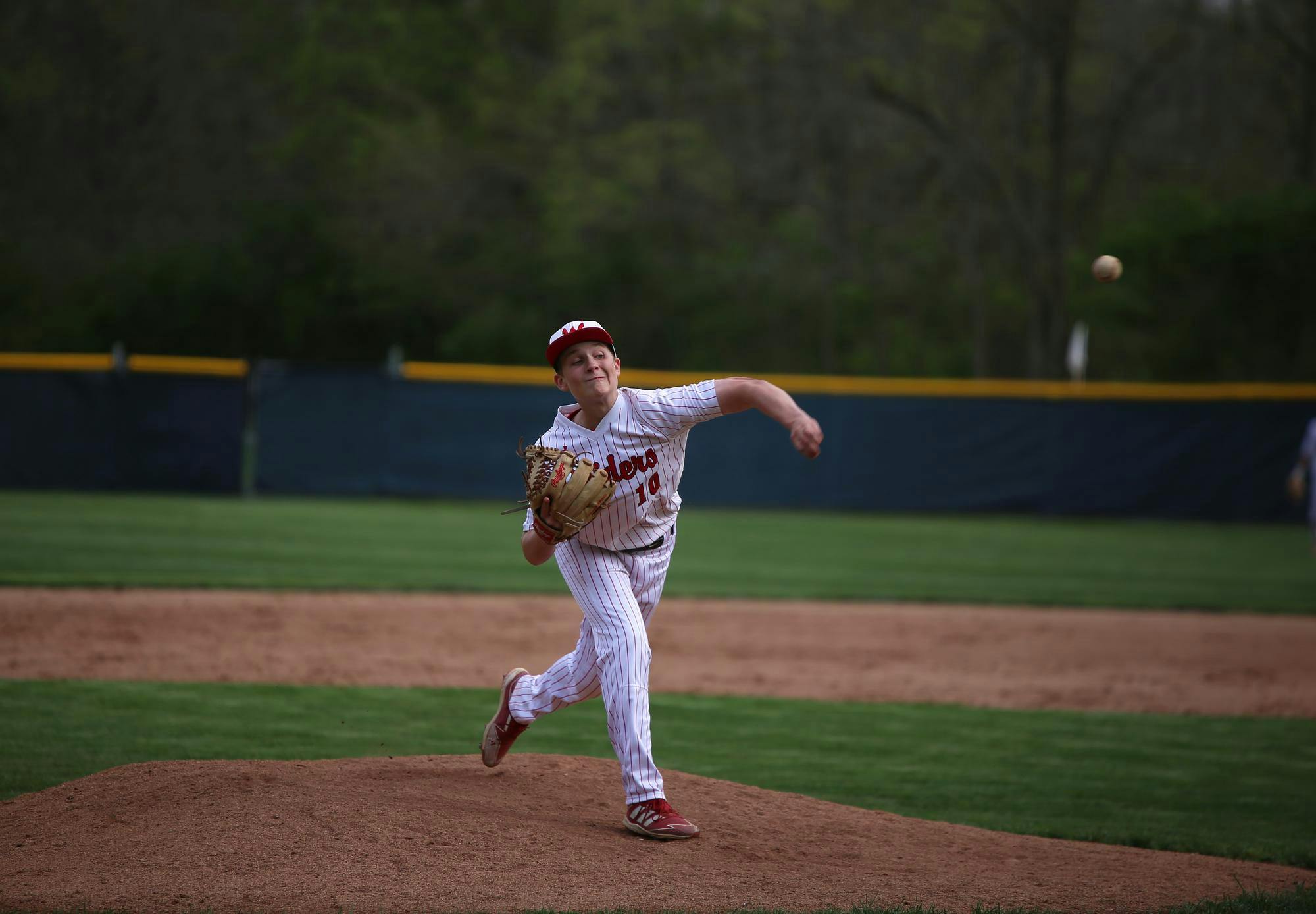 Wapahani freshman Kayson Perdue pitches April 19 during a game against Alexandria at Wapahani High School. Zach Carter, DN.