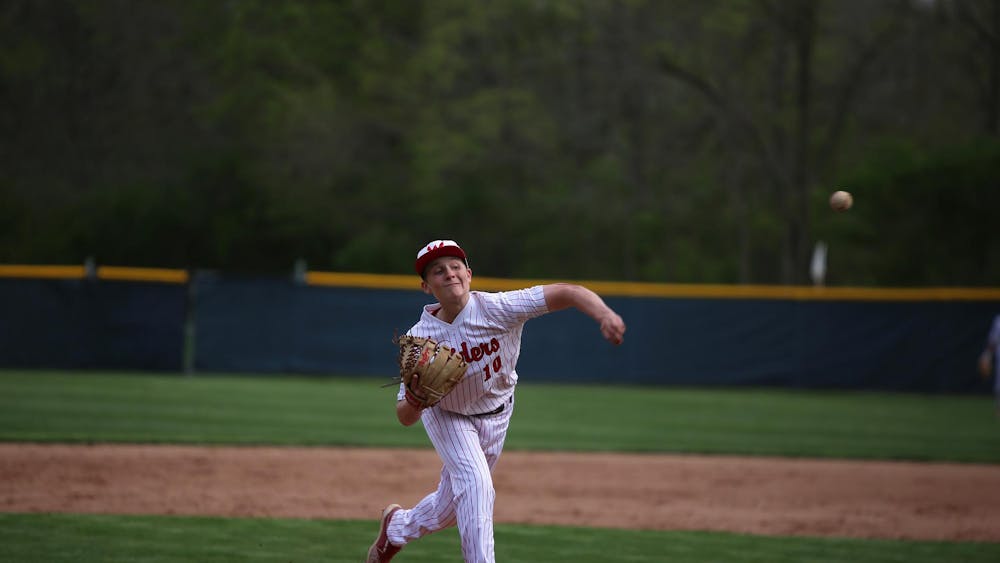 Wapahani freshman Kayson Perdue pitches April 19 during a game against Alexandria at Wapahani High School. Zach Carter, DN.