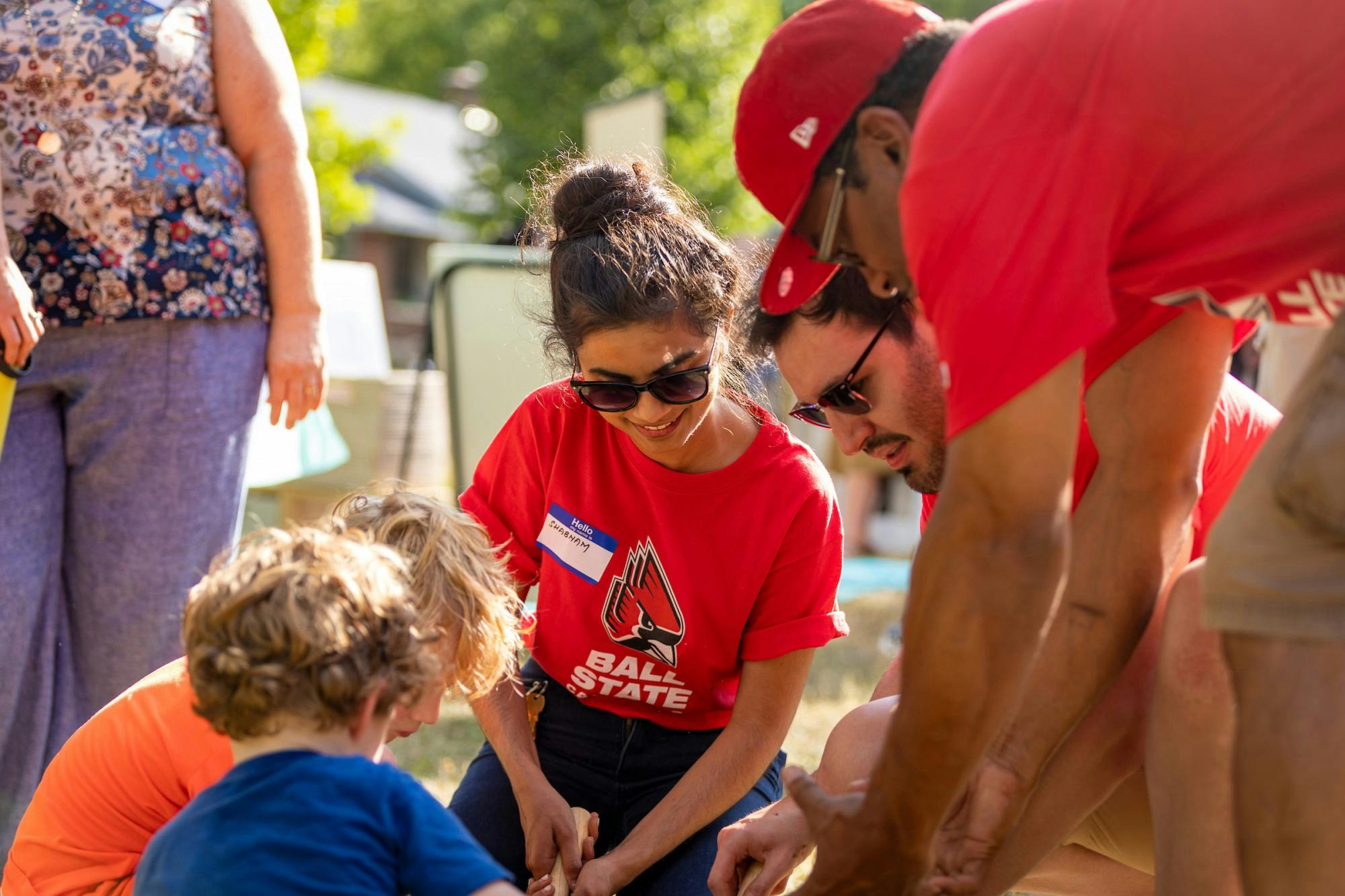 Ball State CAP students help guests in the ground break of the Alley House project July 12. Bobby Ellis, Photo Provided