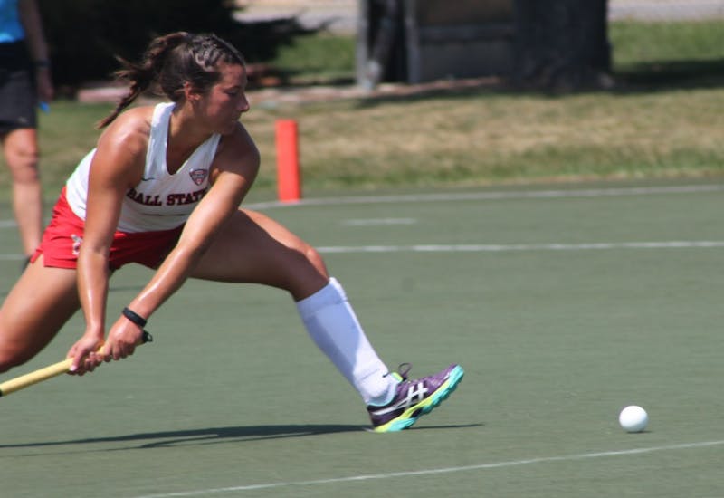 Junior midfielder Anya Eicher attempts to hit the ball away against Ohio on Aug. 27 at Briner Sports Complex. Eicher had one goal and an assist in the game. Patrick Murphy // DN