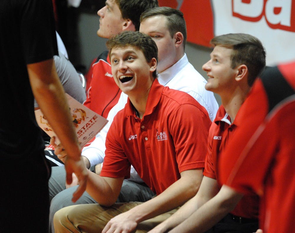 Shane Witmer laughs on the bench during a match this season. Witmer&nbsp;serves as a volunteer coach for the Ball State men's volleyball team after playing four years.&nbsp;DN PHOTO ALLISON COFFIN