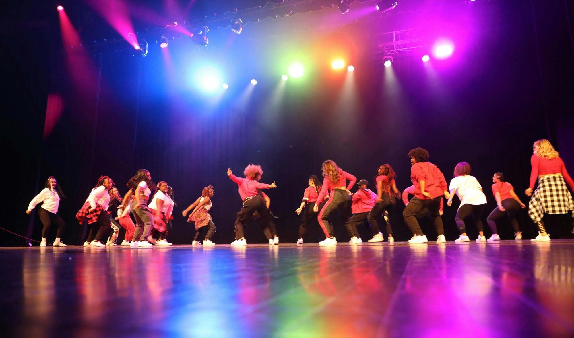The Outlet team dances during their performance at Homecoming Week&#x27;s Air Jam event held on Oct. 21 at Emens Auditorium. Outlet took home both overall and independent winner at the event. Eli Houser, DN