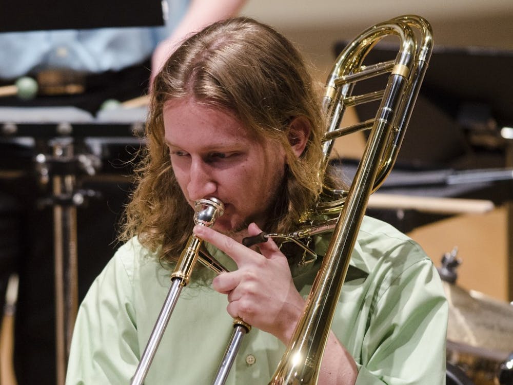 Trombonist David James performs on May 1 with the Brazilian Ensemble at John J. Pruis Hall. The coordinator of the Ensemble was Bruno Carera, who arranged the music. Stephanie Amador // DN 
