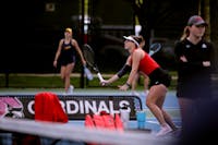 Sophomore Mariya Polishchuk prepares to go for the ball in the women's tennis MAC Champtionship match against Toledo May 1 at Cardinal Creek Tennis Courts. Amber Pietz, DN