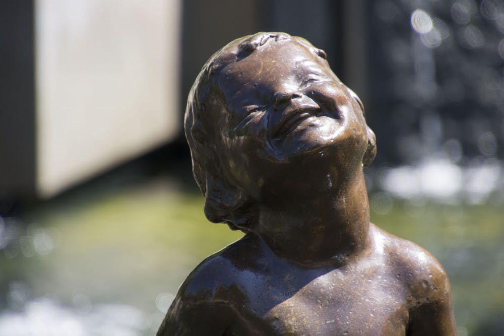 <p>In 1937, Frog Baby came to Ball State. It was originally placed in the Ball State Museum of Art before being moved to the fountain, where it resides today. <strong>Samantha Brammer, DN File</strong></p>