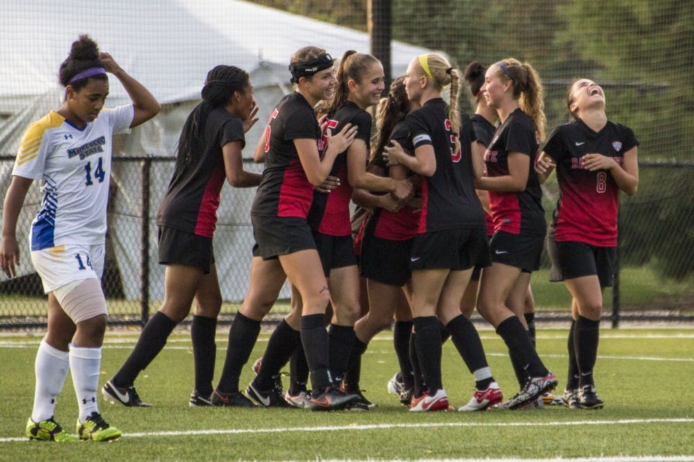 The Ball State soccer team celebrates a goal made by forward Kelsey Wendlandt during the game against Morehead State on Sept. 16 at the Briner Sports Complex. Ball State won 4-0. Grace Ramey // DN