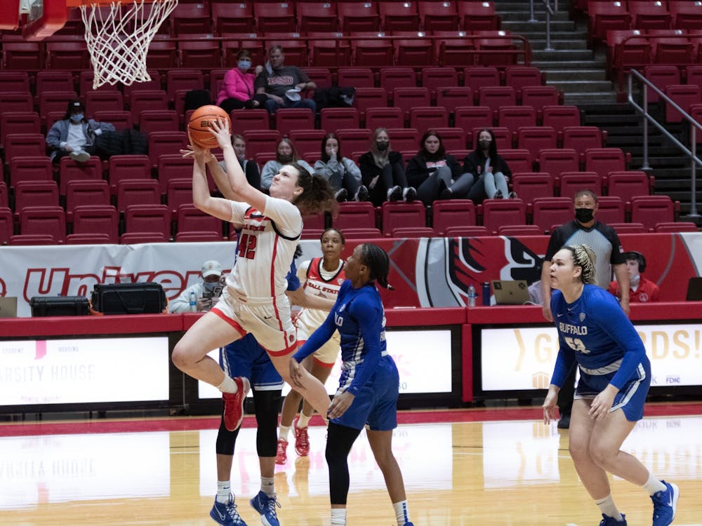 Junior Annie Rauch drives through the Buffalo defense toward the basket Feb. 16, at Worthen Arena. Raunch led the Cardinals in rebounds with 9 including 4 offensive rebounds. Eli Houser, DN