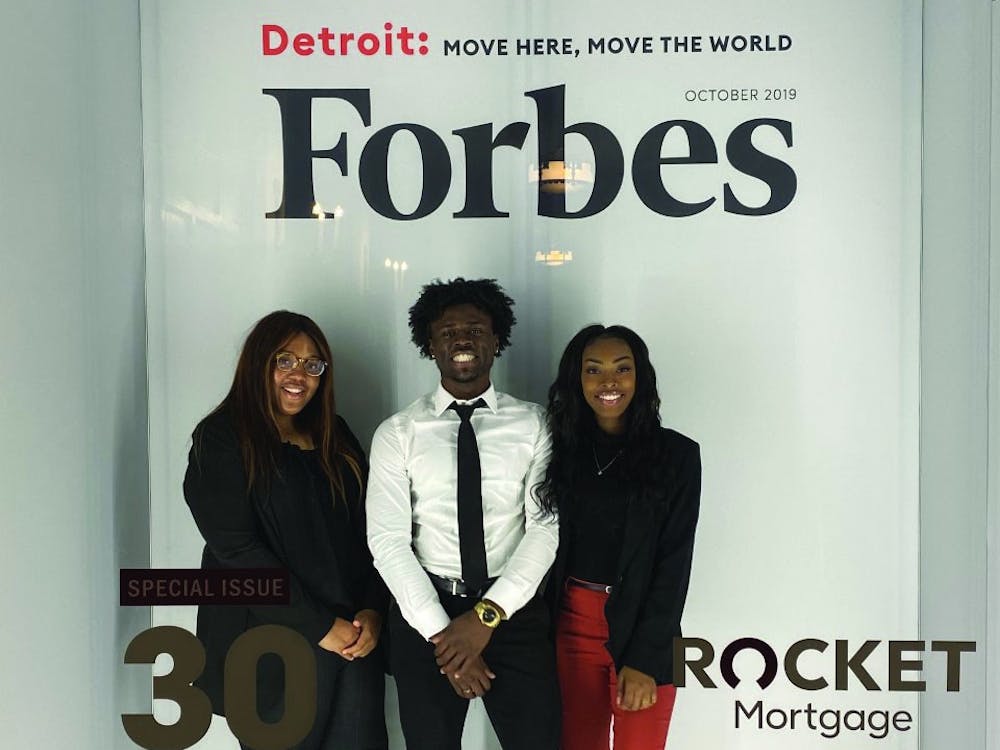 Senior Kaylah Bell (left), junior Aric Fulton Jr. (middle) and senior Tazia Williams (right) attend the Forbes Under 30 Summit Oct. 27-30 in Detroit. Bell, Fulton and Williams were three of 1,000 students selected to receive a scholarship which paid for the fee to attend the conference. Aric Fulton, Photo Provided