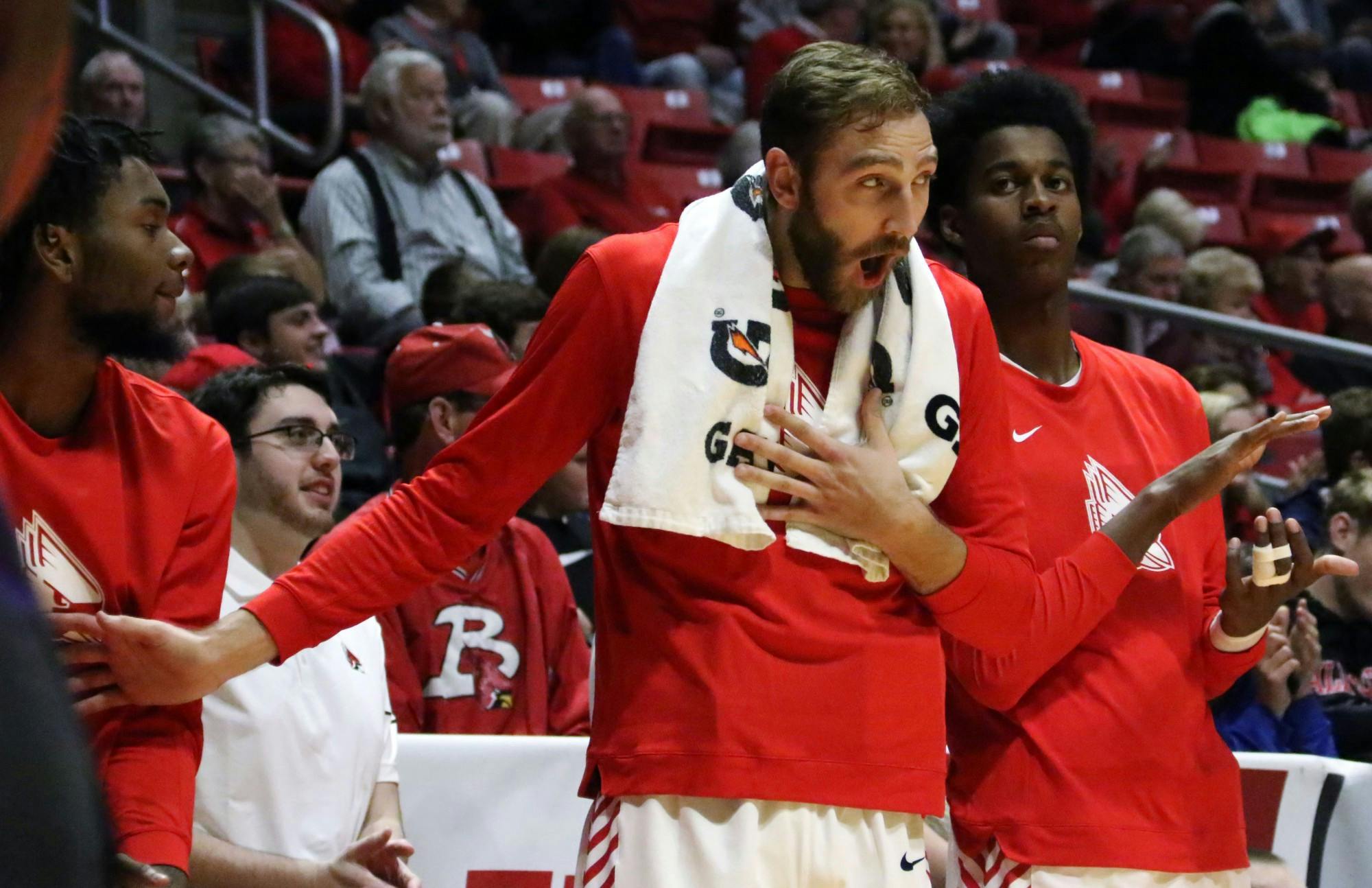 Ball State redshirt junior forward Brachen Hazen reacts to redshirt senior forward Tahjai Teague dunking during the Cardinals' game against Defiance Tuesday, Nov. 5, 2019 at John E. Worthen Arena. Teague scored 11 points. Paige Grider, DN