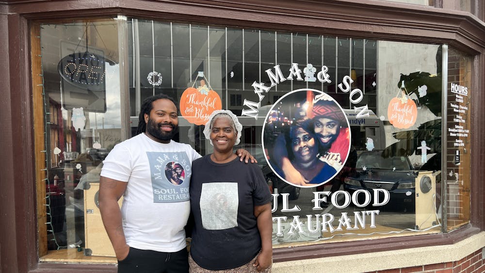 Dominique Isom (right) and Connie Nixon (left) pose for a portrait outside of their soul food restaurant called "Mama and Son Soul Food." Jacy Bradley, DN